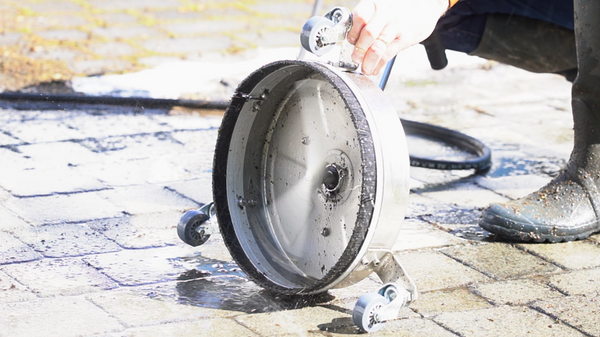 How to use a pressure washer surface cleaner